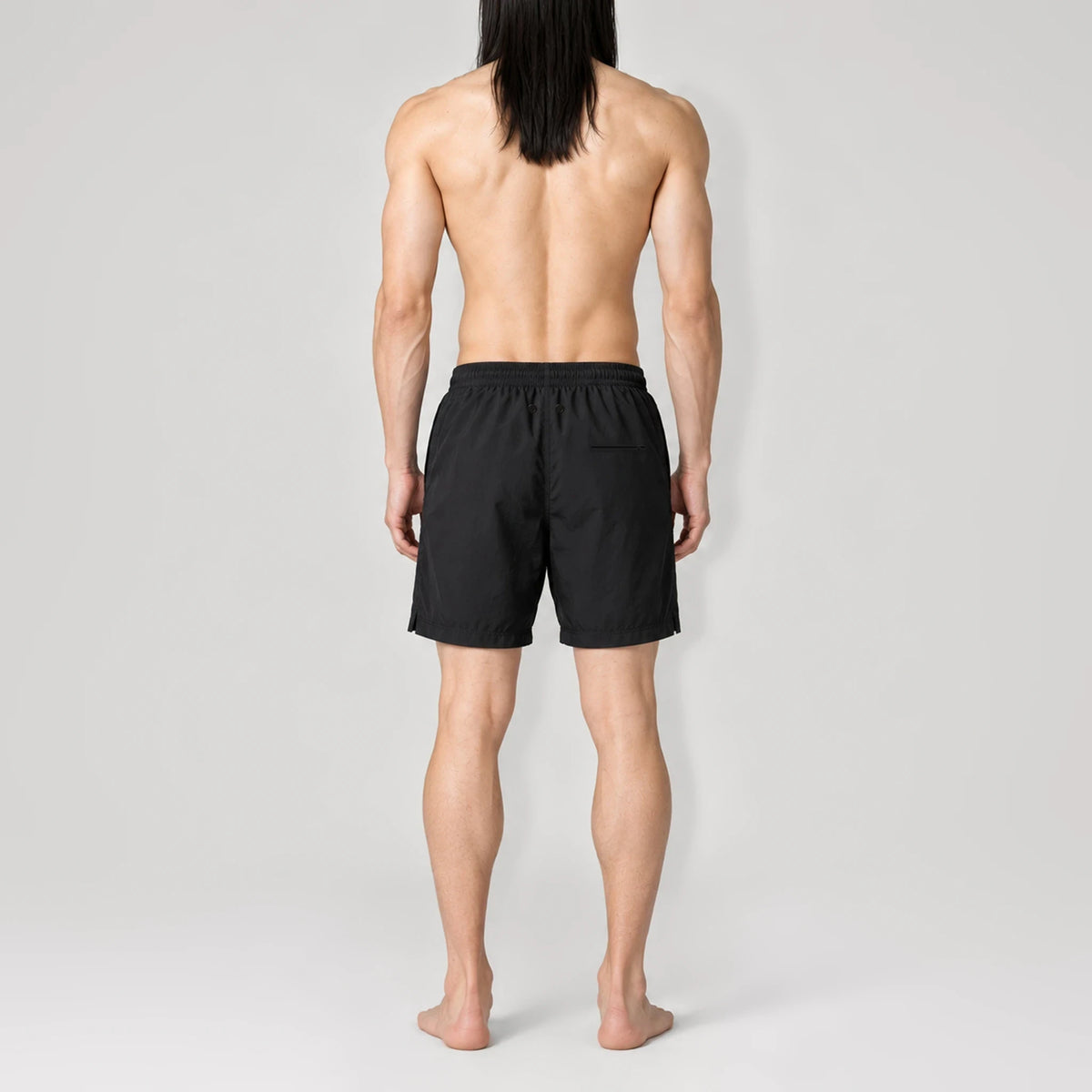 NoirFlow Classic Swim Shorts, back view with zipped back pocket