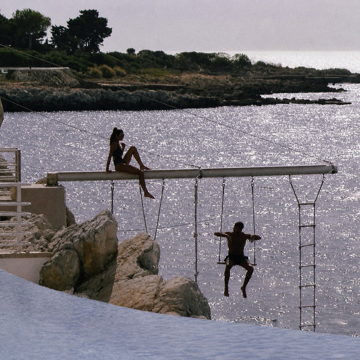 The swing over the sea at Hôtel du Cap-Eden-Roc, Antibes, home of the Eden-Roc x TRUE TRIBE collaboration